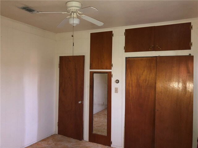 unfurnished bedroom with ceiling fan