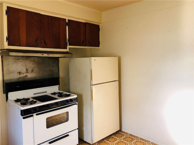 kitchen featuring white appliances and dark brown cabinets