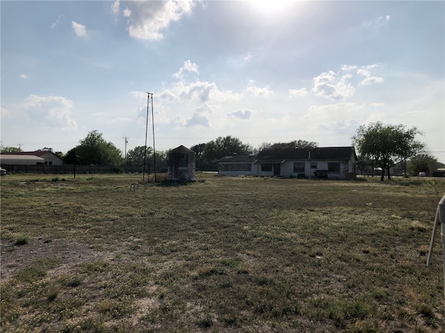 view of yard with a rural view