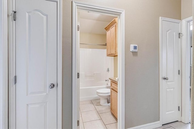 full bathroom featuring vanity,  shower combination, tile patterned floors, and toilet