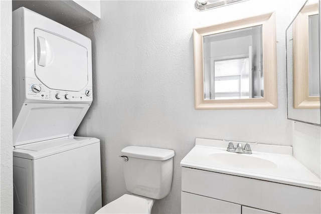 3402 Ocean Dr Unit 16, Corpus Christi, TX 78411 - bathroom with estacked washer and dryer and vanity