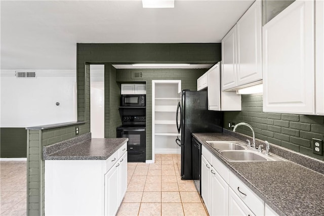3402 Ocean Dr Unit 16, Corpus Christi, TX 78411 - kitchen with black appliances, dark countertops, light tile patterned floors, and backsplash