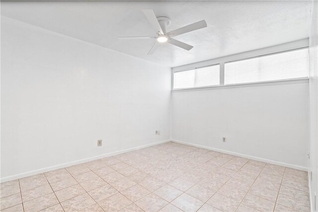 3402 Ocean Dr Unit 16, Corpus Christi, TX 78411 - unfurnished room with ceiling fan and baseboards