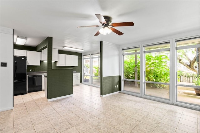 3402 Ocean Dr Unit 16, Corpus Christi, TX 78411 - kitchen with black appliances, a ceiling fan, white cabinetry, and light tile patterned floors