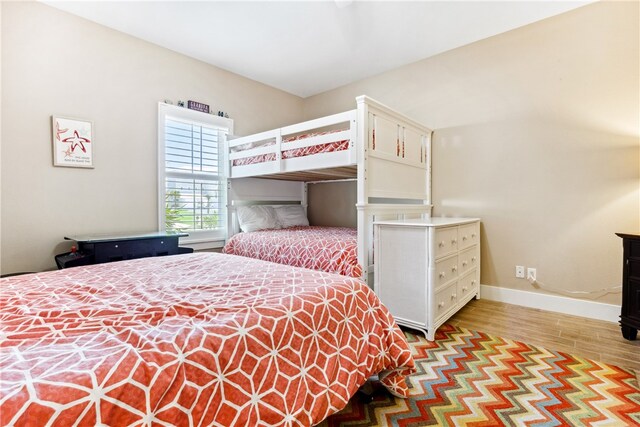 bedroom featuring light wood-type flooring