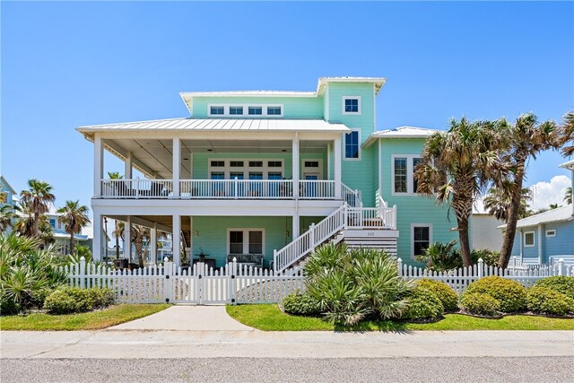 raised beach house with a porch