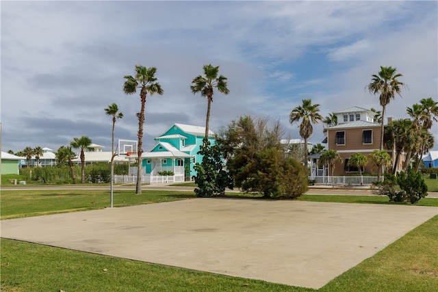 view of community featuring a yard