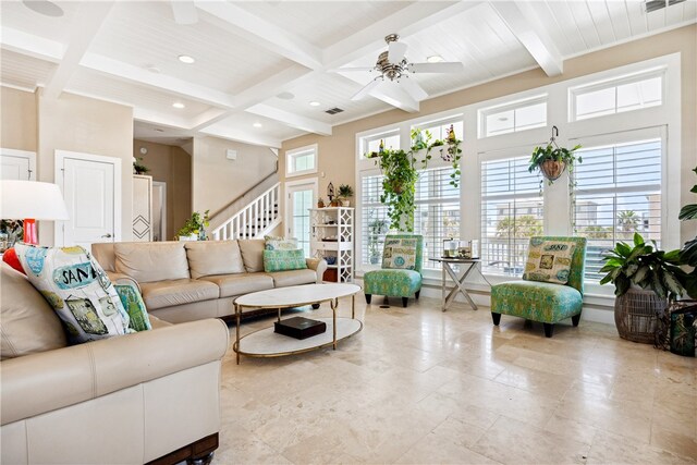 living room with ceiling fan, beamed ceiling, and coffered ceiling