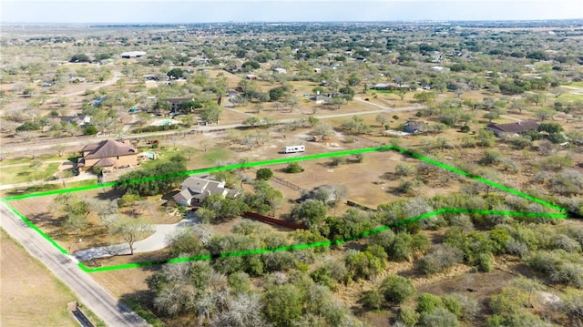 birds eye view of property featuring a rural view