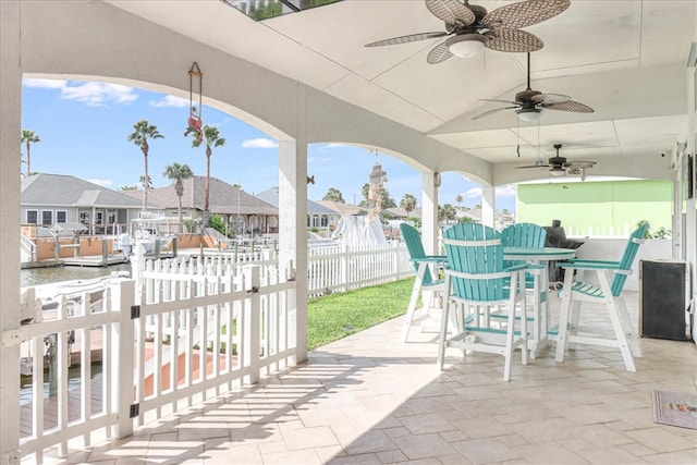 view of patio featuring ceiling fan