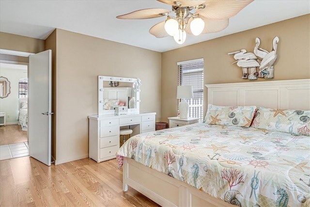 bedroom featuring light wood-type flooring and ceiling fan