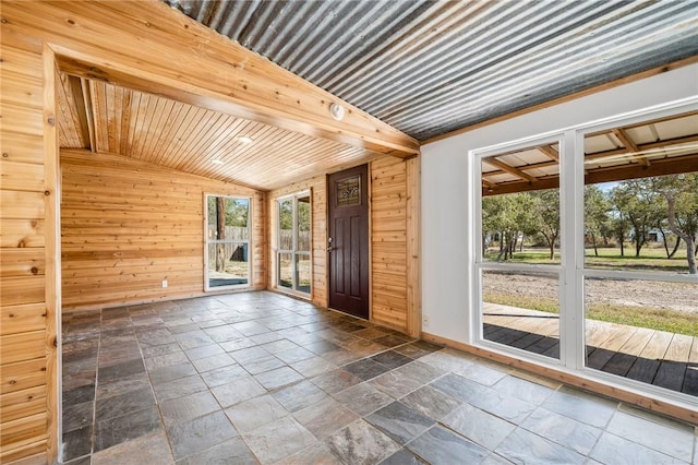 interior space with lofted ceiling and wood ceiling