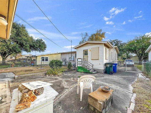 3434 Kay St, Corpus Christi, TX 78411 - back of house with a gate and a patio area