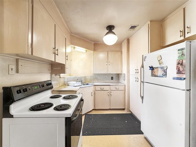 3434 Kay St, Corpus Christi, TX 78411 - kitchen with white appliances, backsplash, and light countertops