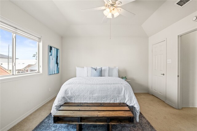 13726 Cayo Gorda Ct, Corpus Christi, TX 78418 - bedroom with visible vents, vaulted ceiling, light carpet, a ceiling fan, and baseboards