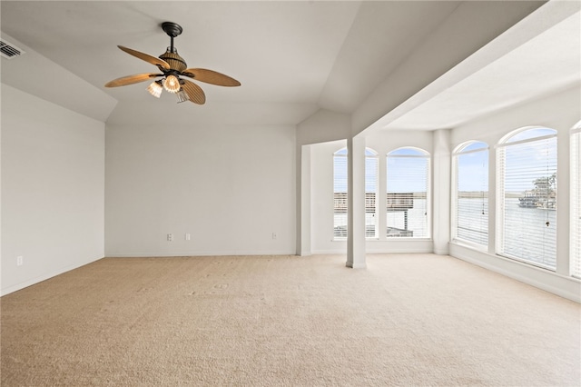 13726 Cayo Gorda Ct, Corpus Christi, TX 78418 - spare room with a water view, light carpet, lofted ceiling, and a ceiling fan