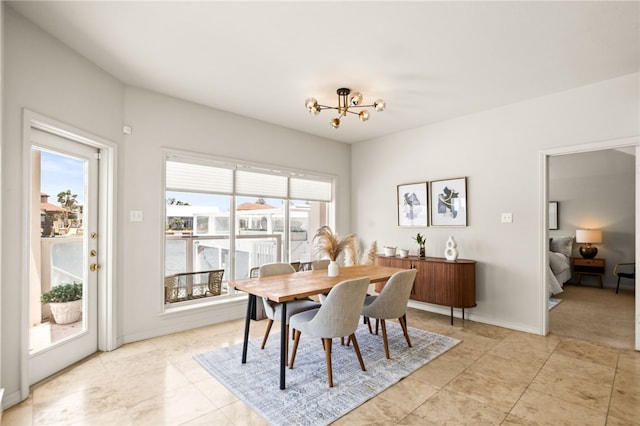 13726 Cayo Gorda Ct, Corpus Christi, TX 78418 - dining room featuring an inviting chandelier and baseboards