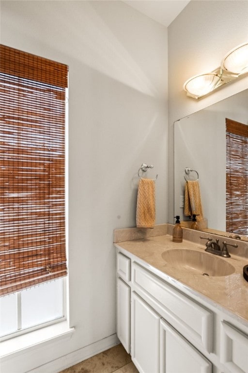 13726 Cayo Gorda Ct, Corpus Christi, TX 78418 - bathroom with tile patterned floors, a wealth of natural light, and vanity