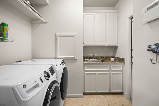 13726 Cayo Gorda Ct, Corpus Christi, TX 78418 - laundry room with a sink, cabinet space, washer and dryer, an AC wall unit, and light tile patterned floors