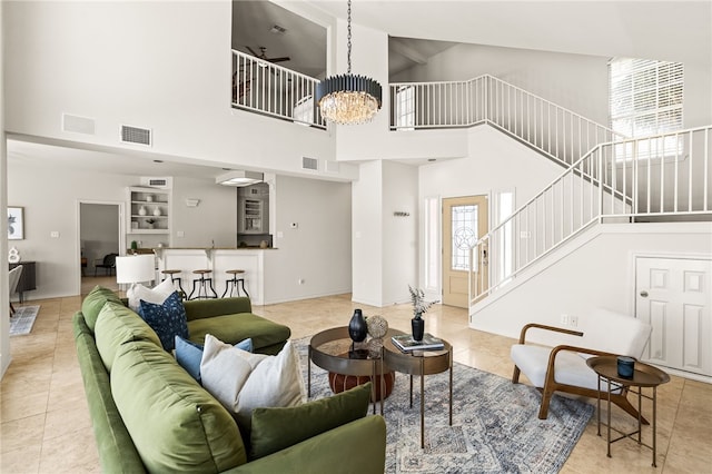 13726 Cayo Gorda Ct, Corpus Christi, TX 78418 - living area with a towering ceiling, light tile patterned flooring, and visible vents