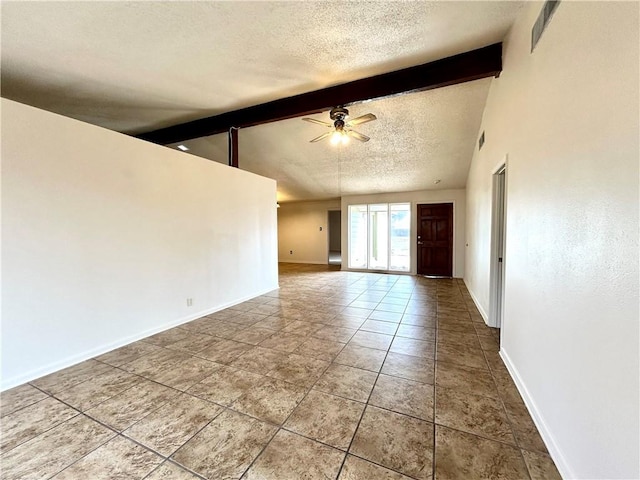 empty room with ceiling fan, tile patterned flooring, lofted ceiling with beams, and a textured ceiling