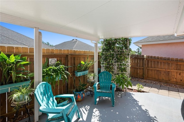 2301 Cyprus Dr, Ingleside, TX 78362 - fenced backyard with a patio