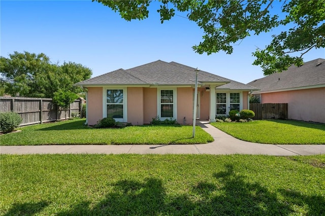 2301 Cyprus Dr, Ingleside, TX 78362 - view of front facade featuring stucco siding