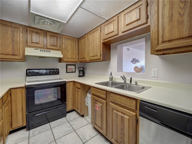 kitchen featuring stainless steel dishwasher, light tile patterned floors, sink, and electric range