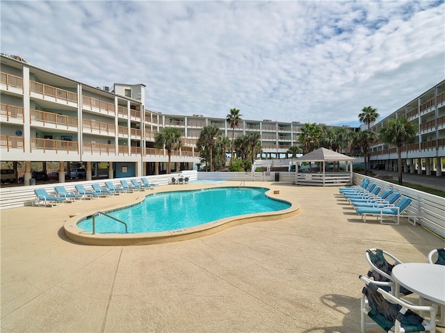 view of swimming pool with a gazebo