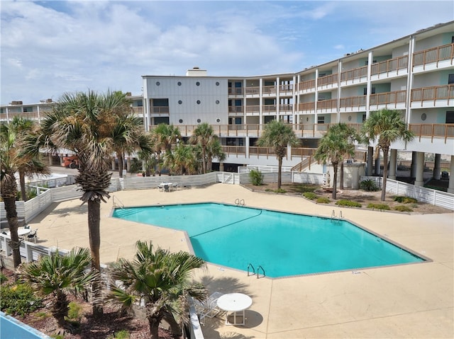 view of pool featuring a patio