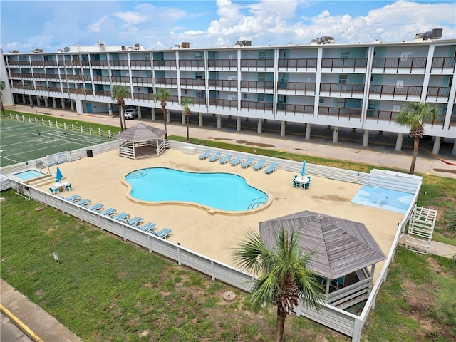 view of swimming pool with a patio