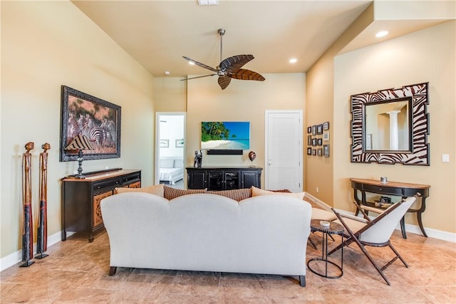 134 La Joya Prt, Aransas, TX 78373 - living area featuring ceiling fan, a high ceiling, baseboards, and recessed lighting
