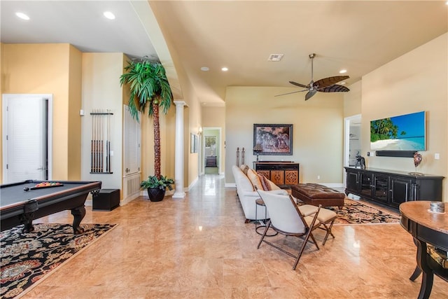 134 La Joya Prt, Aransas, TX 78373 - living area featuring light marble finish flooring, decorative columns, pool table, a ceiling fan, and baseboards