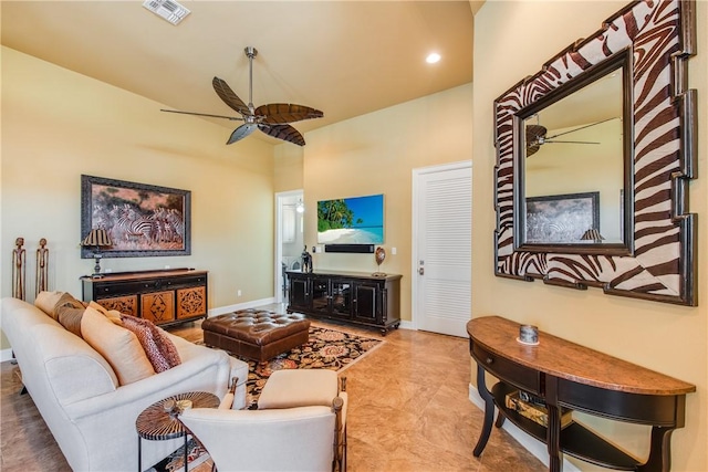 134 La Joya Prt, Aransas, TX 78373 - living room with a ceiling fan, baseboards, and high vaulted ceiling