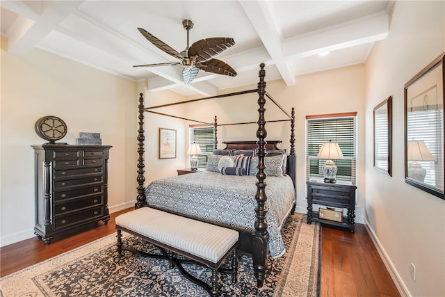134 La Joya Prt, Aransas, TX 78373 - bedroom featuring coffered ceiling, beamed ceiling, dark wood-style floors, baseboards, and ceiling fan