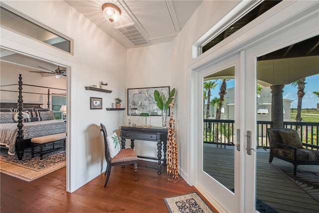 doorway to outside featuring dark hardwood / wood-style flooring, french doors, and ceiling fan