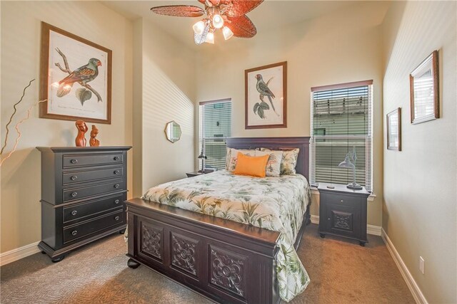 134 La Joya Prt, Aransas, TX 78373 - carpeted bedroom with baseboards and a ceiling fan
