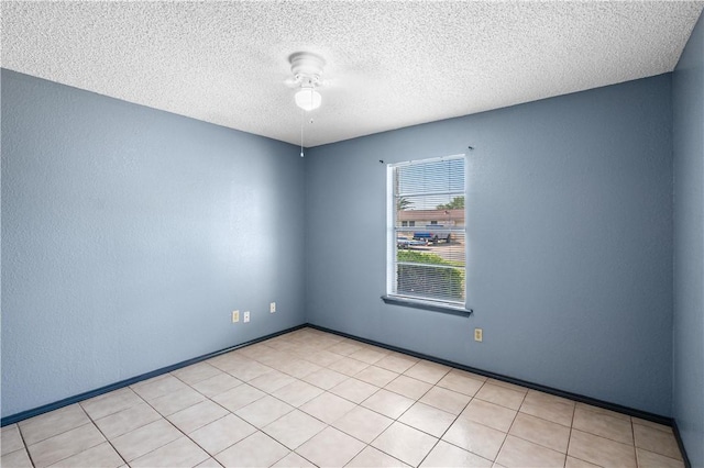 9574 Goldfinch, Corpus Christi, TX 78418 - spare room with ceiling fan, baseboards, and a textured ceiling