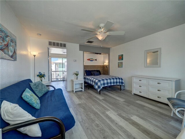 bedroom featuring ceiling fan and light hardwood / wood-style flooring