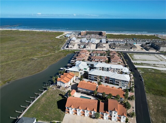 aerial view with a beach view and a water view