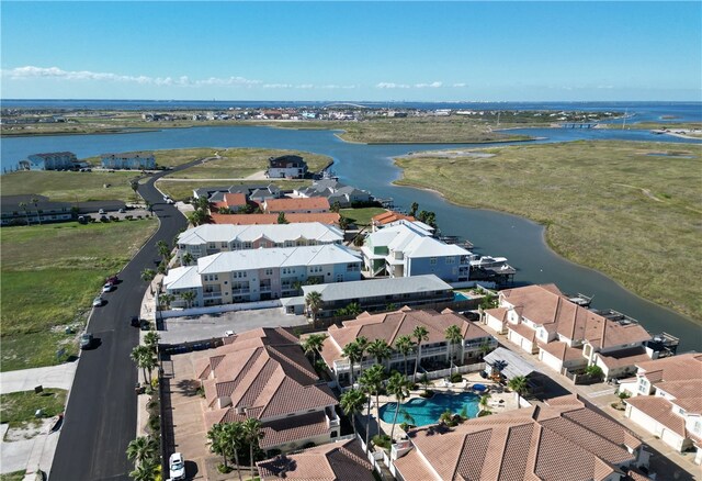 drone / aerial view with a water view