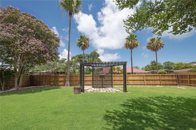 view of yard featuring a pergola and a patio area