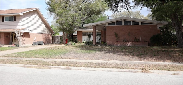 109 Kissling Ave, Robstown, TX 78380 - view of front of property featuring central AC unit and brick siding