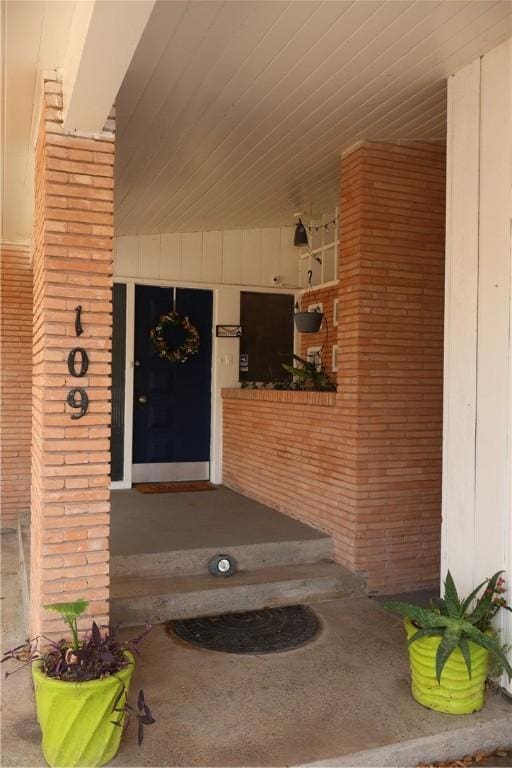 109 Kissling Ave, Robstown, TX 78380 - doorway to property featuring brick siding