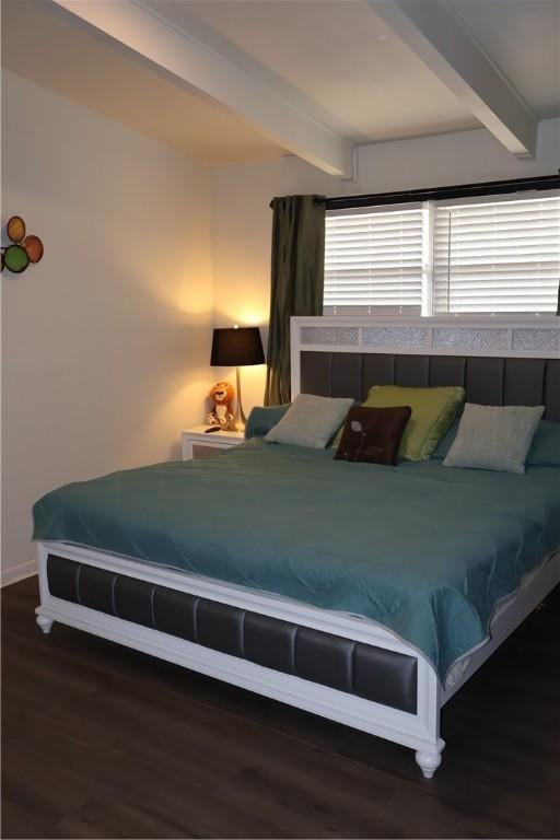 109 Kissling Ave, Robstown, TX 78380 - bedroom featuring wood finished floors and beamed ceiling