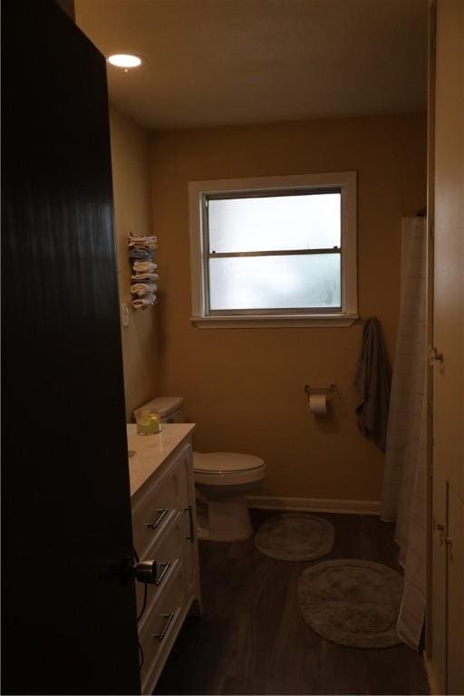 109 Kissling Ave, Robstown, TX 78380 - full bathroom with curtained shower, toilet, and vanity