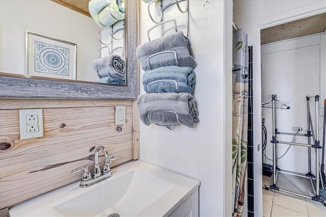 bathroom with tile patterned floors and vanity