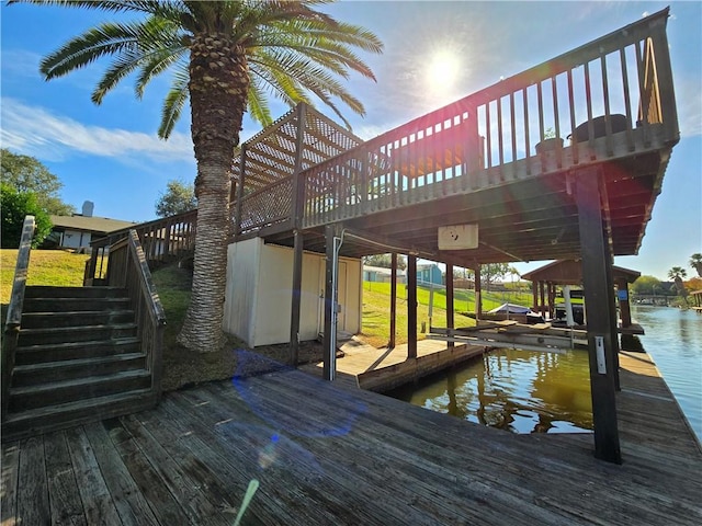 dock area featuring a water view