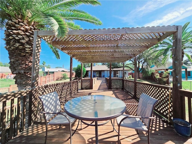 wooden terrace featuring a pergola