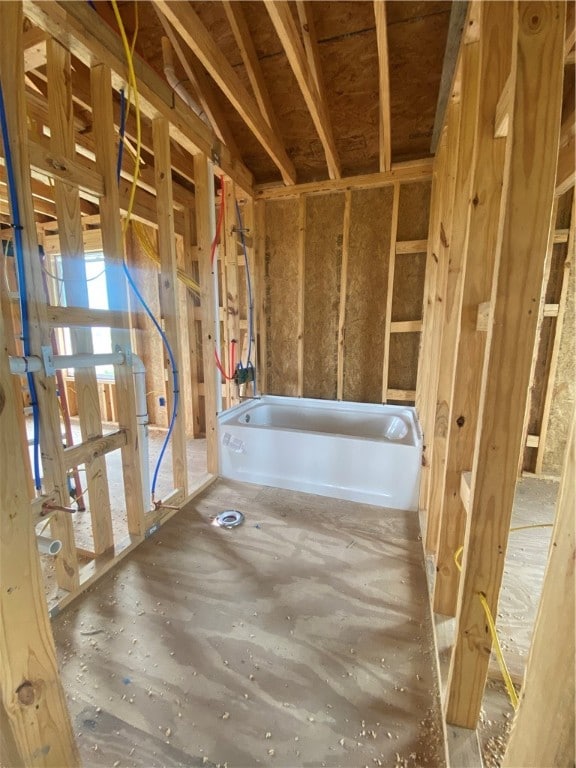 bathroom featuring a tub